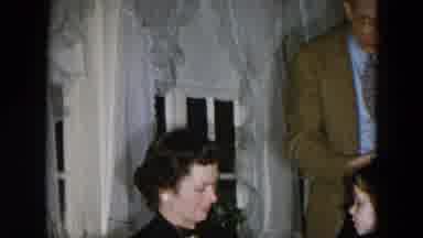 Hicksville New York (1956): A Husband And Daughter Watching A Mother Open A