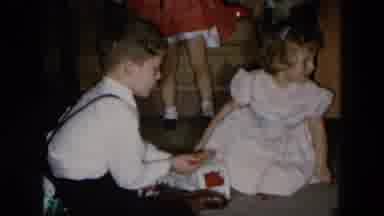 Hicksville New York (1956): Little Girl And Boy Playing With The Same Toy The Boy