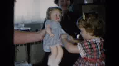 Hicksville New York-1956: Grandpa Gives Little Girl A Doll In A Blue Dress And