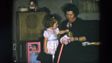 Hicksville New York (1956): Two Young Girls Get Dolls And Toys As Presents From An