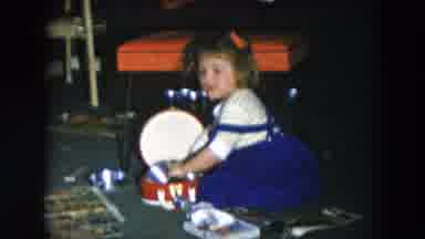 Hicksville New York (1956): Girl Wearing Blue Dress Put Silver Objects Into Red