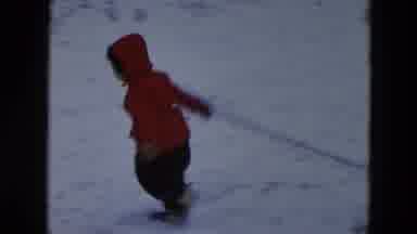 Hicksville New York (1956): Boy Pulling Sled Outside In The Snow With Father Close