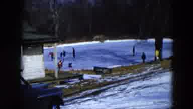 Hicksville New York (1956): People Skating On Frozen Pond On A Sunny Winter Day