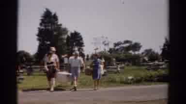 Catskill New York (1957): Family Carries Picnic Basket Across The Road During