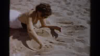 Catskill New York (1957): Two Women Laying On A Sandy Beach Making Shapes In The