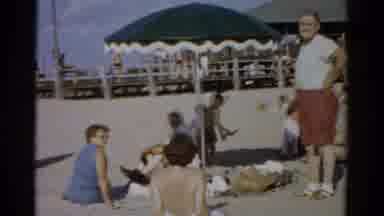 Catskill New York (1957): Family Having A Picnic At The Beach Parents Sitting