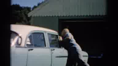 Catskill New York (1957): Man Does Preventive Maintenance Of His Car Including The