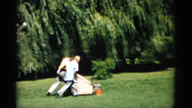 Catskill New York (1957): Two Men Are Pushing A Manual Lawn Mower With A Grass