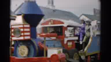 Catskill New York (1957): People Watching Blue And Yellow Train Parade Float On A