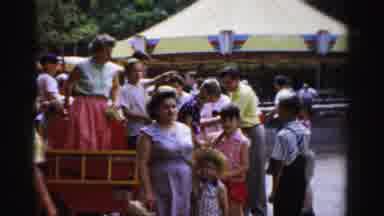 Catskill New York (1957): People Getting Off Of A Ride At An Amusement Park