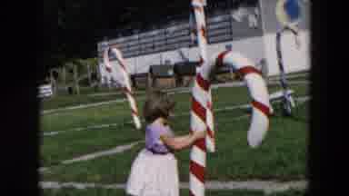 Hicksville New York (1957): Toddler Girl Hugging Holding Large Candy Cane In A