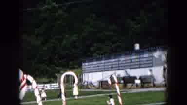 Hicksville New York (1957): Girl Wearing Red Shorts Plays With Car Steering Wheel