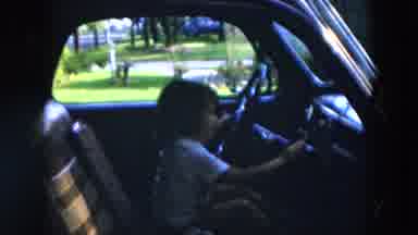 Hicksville New York (1957): Little Girl Pretends To Drive Car Parked Out In The