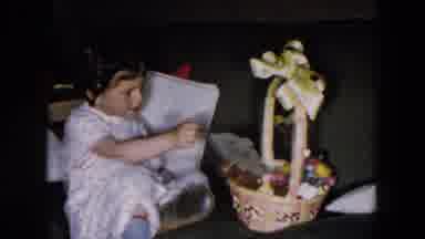 Hicksville New York (1957): A Little Girl In Pajamas Enjoys Looking Through Her