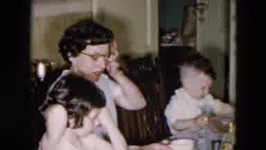 Hicksville New York (1957): Woman Wearing White Shirt And Glasses Gets Up From