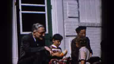 Hicksville New York (1957): A Group Of Kids And Adults Socializing While One Boy