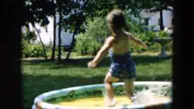 Hicksville New York (1957): A Little Girl Playing In Water On The Tub With Her