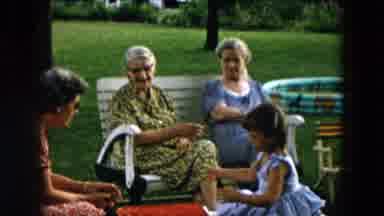 Hicksville New York (1957): One Family Speaking Something In The Garden Area Near