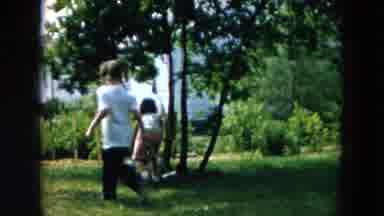 Hicksville New York (1957): A Small Boy And Girl Is Playing With A Ball In The