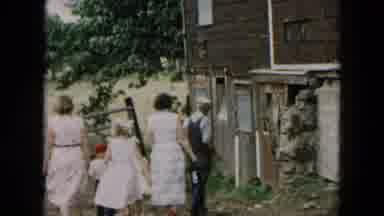 Hicksville New York (1957): A Man Kids And Woman Walk Into Barn On A Windy Day