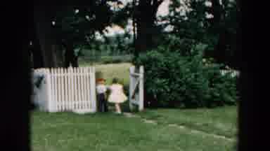 Hicksville New York (1957): A Little Boy And A Little Girl Inspects Something