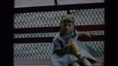 Hicksville New York (1957): Girl Wearing Blue Dress Walks Behind Woman Wearing