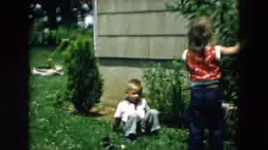 Hicksville New York (1957): Girl Wearing Red Shirt Sits In White Lawn Chair On A