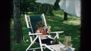 Hicksville New York (1957): Young Girl Sitting In A Lawn Chair Cutting Papers With