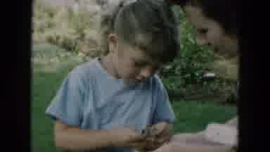 Hicksville New York (1957): A Little Girl Giving Something To Her Mom