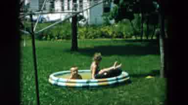 Hicksville New York (1957): Two Kids Happily Play In Kiddie Pool With Inflatable