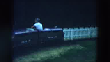 Hicksville New York (1957): Man Operating A Miniature Train On Tracks At A Small