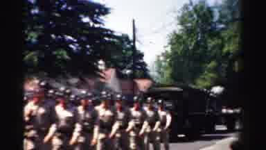 Normal Illinois USA (1957): Soldiers Walking Through Town With A Truck And A