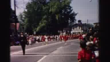 Normal Illinois USA (1957): Groups Walking In A Parade Some Are Carrying Signs