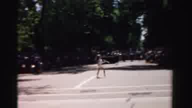 Normal Illinois USA (1957): Single Girl Baton Routine In Middle Of Street