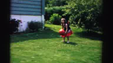 Normal Illinois USA (1957): Two Little Girls Wearing Matching Dresses Outside