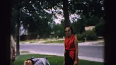 Normal Illinois USA (1957): People Standing And Sitting In A Yard Next To The