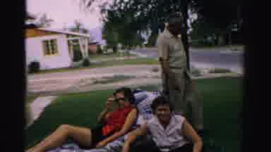 Normal Illinois USA (1957): Family Laying Out On The Yard Spending Time With Each