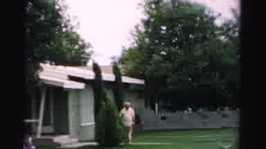 Normal Illinois USA (1957): Old Man Outside Looking At The Wind Going On Around