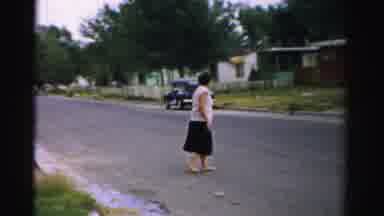 Normal Illinois USA (1957): The Mom And Father Doing Walking In The Opposite