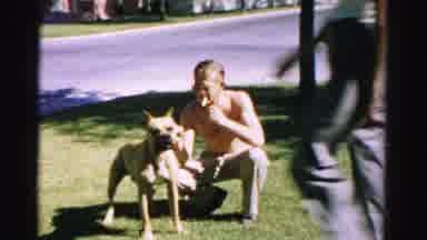 Normal Illinois USA (1957): Two Men Outside On The Grass With A Big Dog