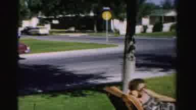 Normal Illinois USA (1957): Suburban Front Yard With People Sitting In Chair And