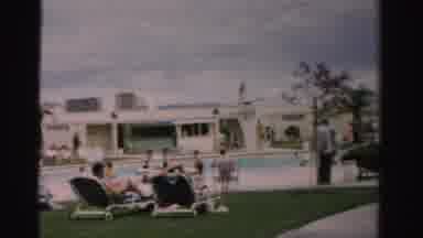 Las Vegas Nevada (1957): People Walking And Sitting At Some Sort Of Resort With A