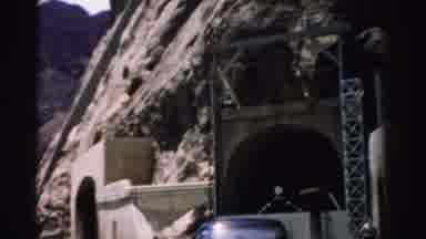 Nevada USA (1957): Rocky Cliffs Loom High Above A Series Of Tunnels And Shafts