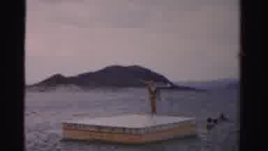 Nevada USA (1957): Woman Walking On Platform Floating On Lake In Summer While