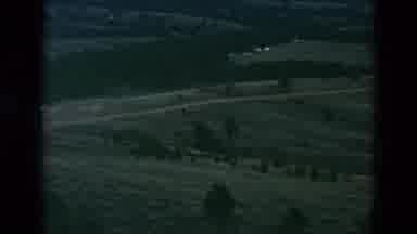 OREGON USA-: Aerial View Of Green Fields And Brown Dirt Road On A Bright Sunny