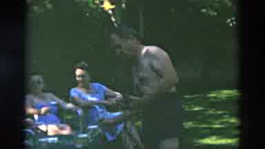 OREGON USA-: Family Sitting Outside In The Shade Enjoying Eachothers Company