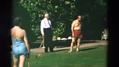 OREGON USA-: English Summer Garden Lady And Man In Swimwear Playing Croquet On