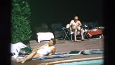 OREGON USA-: Adults Outdoors At The Hotel Laying Enjoying The Sun As Well As