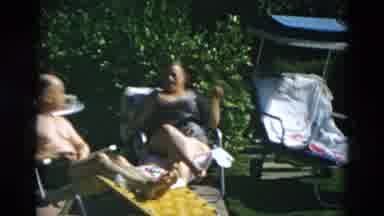 OREGON USA-: Adults In Swimsuits Sitting In The Sun Laughing And Talking