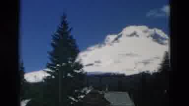 OREGON USA-: Vintage People Walking On The Snow With Three And Mountains In